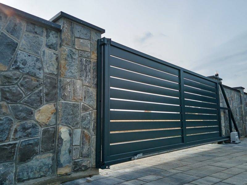 Wide,Automatic,Sliding,Gate,With,Remote,Control,Installed,In,High