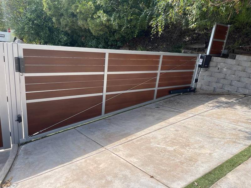 installing front wall perimeter with electric gate system